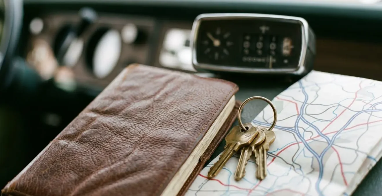 Split scene showing car keys next to calculator and mileage log book for UK business vehicle deductions